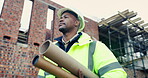 Black man, plan and thinking on construction site for development, property renovation or inspection. Engineer, vision and blueprint tube at worksite for building expansion, design ideas or low angle