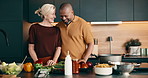 Smile, cooking and interracial couple in home with support, love and meal prep with healthy food in kitchen. Mature, man and woman with ingredients for recipe, help and culinary skills for nutrition