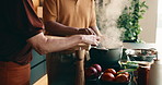 Pot, cooking and hands of couple in kitchen at house for meal, dinner or supper with healthy diet. Steam, stir and man with woman for preparing dish with wellness, nutrition or recipe in apartment.