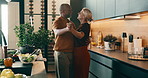 Dancing, happy and couple in kitchen for cooking with music for bonding, love and connection. Smile, care and mature man with woman for moving to romantic playlist with preparing meal in home.