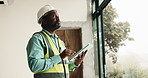 Civil engineer, inspection and man with tablet in house, property management and digital floor plan. Mature architect, online and black person with tech, home renovation and quality assurance on web