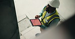 Architect, inspection and black man with tablet screen for construction or building safety above. Top view, male person or civil engineer checking security with technology for architecture on site