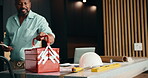 Maintenance, renovation and toolbox with black man in kitchen for home improvement or upgrade. Construction, equipment and service with mature contractor in modern apartment for building project