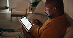 Night, man and remote work in home with tablet, data analysis and monitor stock market for investment. Late, mature black person and scroll with tech, online trading stats and graphs for investor.