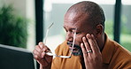 Man, headache and glasses in home office with computer, wrong prescription lens or remote work stress. Tired, mature black person and freelancer in house with eye strain, spectacles and glitch on pc.