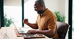 Black man, laptop and fist pump with celebration for remote work, editing article or creative in home. Project success, freelance writer and tech for approval with mature editor for story development