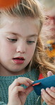 Child, building and rocket in home for craft, education and homemade for science fair. Kid, girl and construction at house for diy aerospace, creative activity and outer space for school assignment