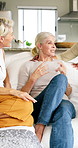 Bonding, relax or friends in home with chat, casual conversation or happy moment in reunion. Smile, break or mature women with group hangout, gossip reaction or connection in healthy relationship.