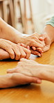 Holding hands, friends and women in home, prayer for compassion and empathy for grief. Apartment, gratitude and people in living room, conversation and sympathy with comfort, consoling and hope
