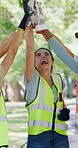 Celebration, volunteer or people with high five in park, environment sustainability or eco campaign. Laughing, friends or happy team with goal of nature conservation, community service or success