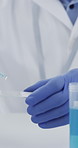 Hands, scientist and vial with beaker at laboratory, medical research or gloves for virus sample on film. Person, tools and ppe equipment with pharmaceutical innovation, liquid or vaccine development