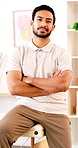 Face, man and chiropractor with confidence in office for healthcare, wellness or physical therapy. Portrait, arms crossed and physiotherapy worker with career pride, healing or rehabilitation service