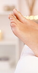 Relax, woman and foot acupuncture at spa for pain relief, nerve regeneration or holistic therapy. Expert, person and needles at wellness clinic for alternative medicine, treatment and tissue recovery