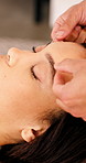 Hands, forehead and woman at spa for acupuncture, muscle tension and beauty with natural facial. People, needle and physical therapy at salon with traditional medicine, dry needling and stress relief