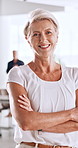 Face, mature and woman with arms crossed in office, talent management and human resources career. Portrait, professional and manager with confidence for employee relations, recruitment and smile