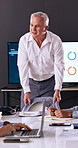 Meeting, start and man in office with business people for company profit, revenue and pitch. Administration, CEO discussion and financial manager with digital tech for graphs, approval or promotion