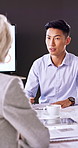 Meeting, conversation and man in office with business people for company profit, revenue and pitch. Administration, agenda and financial manager with digital tech for graphs, budget or paperwork
