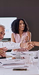 Handshake, celebration and team with applause for success, merger or collaboration goal. Clapping hands, laptop and excited business people for partnership, good news or congratulations in office