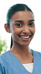 Face, nurse and happy woman with pride for healthcare aid, medical service or advice. Portrait, female person or health worker with smile for medicare, assurance or volunteering in nursing home