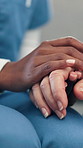 Woman, nurse and holding hands with senior patient for empathy, healthcare or understanding in home. Female people, caregiver and touch with elderly care for comfort, sympathy or trust in house