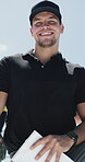 Face, man and smile with baseball coach outdoor for game strategy, match tactics or planning. Below, competition and notebook with happy person at windy sports venue for tournament preparation