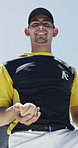 Face, man and baseball pitcher with ball at sports park, fitness and confidence for competition. Portrait, player or professional athlete with equipment outdoor, smile or game training with low angle