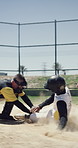 Running, man and slide outdoor for baseball, fitness and competition with game action. Athlete, people or defensive play on field with speed, tag avoidance and ball for base shot of sports tournament