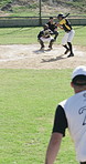 Outdoor, throw or people with baseball bat for fitness, swing practice or concentration for competition. Training, team or players with gear for contest preparation, pitch drills or skill development