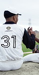 Baseball, team and handshake on field with break, fitness training and point for funny discussion. Men, shaking hands and laugh outdoor on pitch with practice recovery, conversation or joke for sport