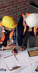 Construction, blueprint and team with site checklist for building regulations, inspection or above. Men, discussion or workers with clipboard for project timeline, compliance notes or progress review