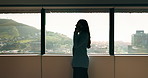 Woman, phone call and talk at window in office with profile, contact and advice at insurance company. Person, broker or discussion at glass for career, review or feedback at risk management agency