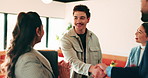 Handshake, teamwork and business man with success or applause, collaboration and congratulations. People, group and happy in creative agency for onboarding, welcome or discussion in modern office