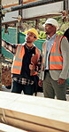 Construction, team or pointing with checklist on site for quality control, track progress or safety. Men, architect and project manager with clipboard for code compliance, inspection and scaffolding