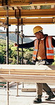 Construction, dancing or black man on site with achievement, rhythm or fun groove with celebration. Renovation, energy or engineer with scaffolding, feel good or upbeat movement in building milestone