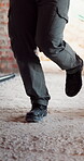 Construction, dance and legs on site with break, rhythm and playful groove with project pause. Energy, man or engineer in building with fun, feel good and upbeat movement with work downtime.