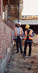 Construction, team or site inspection with tablet for masonry safety, wall structure or compliance. Inspector, foreman and tech outdoor for defect management, quality assurance and phase assessment