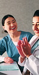 Laptop, doctors or woman with applause in clinic for clear lab results, patient remission or success. Excited, medical team and tech with clapping for organ donor match, breakthrough and celebration
