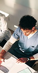 Meeting, doctors and people with paperwork in office, patient records and treatment plan finished. Hospital, team and specialist with medical report for condition insight, above or diagnosis complete