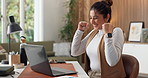 Fist pump, laptop and remote work with woman in home office for celebration, goals or victory. Applause, good news and success with happy person at desk in apartment for win as freelance employee
