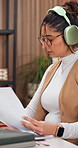 Freelancer, document and woman with laptop in home office, info and financial report with headphones. Accountant, remote work and person with tech for music, graphs and data entry on website in house