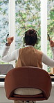 Headphones, dancing and back of woman in house for studying with elearning for university test. Audio tech, education and student with moving to music, playlist or album with college application.