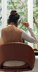 Headphones, dancing and back of woman in home for studying with elearning for university test. Audio tech, education and student with moving to music, playlist or album with college application.