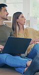 Moving, discussion or couple with laptop in new home, remodeling idea or online shopping for furniture. Smile, ecommerce or people with planning for property renovation, pc or interior design upgrade