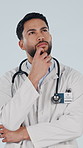 Thinking, face and doctor in studio with decision, choice and solution for medical service. Healthcare, portrait and man with reflection for planning, idea and problem solving on white background