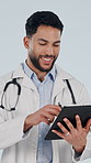 Smile, doctor and reading in studio with tablet, research and contact patient for medical results. Man, scroll and tech for communication, agenda update and telehealth information on white background