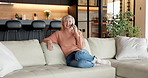 Woman, phone call and laughing on couch in lounge, relax and communication with contact and network. Mobile, chat and mature person with smile, chill and gossip with tech or funny discussion in home