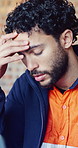 Stress, man and construction worker with headache on site for deadline on repairs, maintenance or project. Migraine, burnout and civil engineer with fatigue or exhaustion for property development.