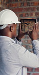 Construction, man or picture of brick wall on tablet screen for wiring, inspection or safety record. Electrical engineer, black person or photo on site for quality control, compliance or conduit path