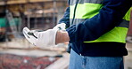 Architecture, builder and hands with gloves, building site and safety for manual labor or renovation. Outdoor, construction and person with ppe for property development, civil engineering and project