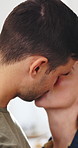Happy, couple and love with kiss in home for romance, intimacy or affection together. Man, woman or forehead with gentle touch, hug or smile for embrace, loyal commitment or relationship in house
